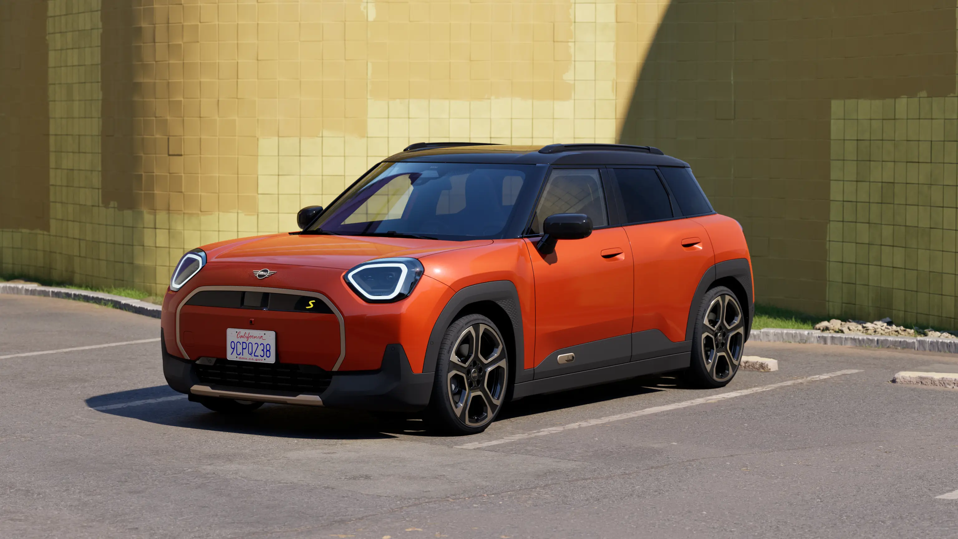 Video showcasing the interior and exterior of a all-electric MINI Aceman in detail. The camera pans over the dashboard, highlighting design elements